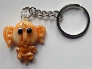 Brelok Figurka szklana Słoń brązowy FS średnia